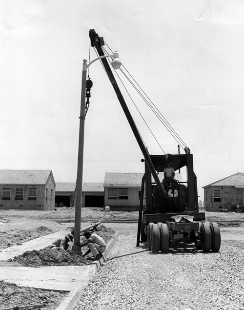 Street light pole being installed