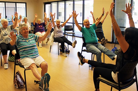 Seniors in chair exercise class