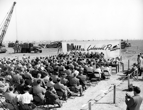 A large crowd watches the groundbreaking for the May Company department store