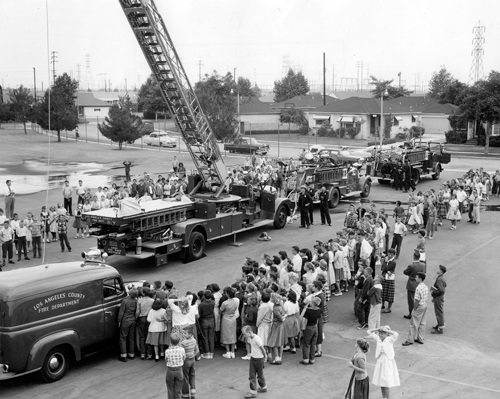 Crowd looking at rescue and fire fighting equipment
