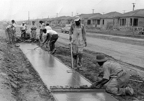Cement crew laying sidewalks