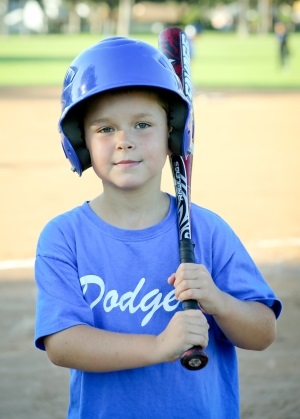 Lakewood Youth holding baseball