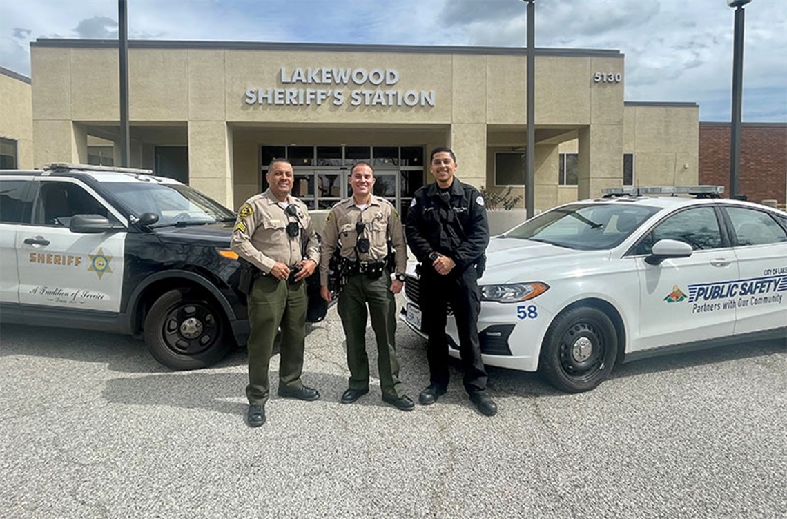 Deputy Sheriffs and Lakewood Public Safety staff with vehicles in front of Lakewood Sheriff's Station